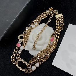 Biżuteria naszyjniki białe platowane 925 srebrne studia luksusowe projektanci marki listy geometryczne słynne kobiety okrągłe kryształowe rhinestone złoto 86