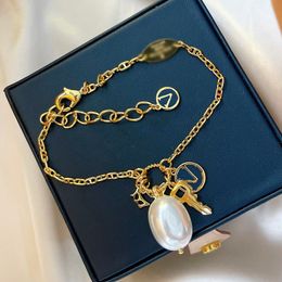 Designer Luxury 2024 New Brass Bracelet Famous French Brand Classic Cross Old Flower Key Pearl Multi Element Pendant Women Charm Jewellery Girl Fashion Gift