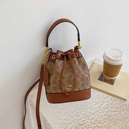 Old Flower Bucket Bag 2023 New live streaming women's with drawstring portable foreign style one shoulder crossbody bag 7889