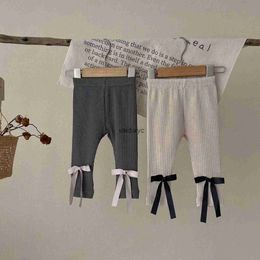 Trousers New Baby Cotton Leggings Solid Infant Stretch Pants Toddler Girl Bow Leggings ldren Trousers Autumn Baby Clothes 0-24M H240508