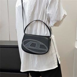 Niche design new product single shoulder crossbody underarm ding dang bag fashion portable celebrity small square for womencode 7889