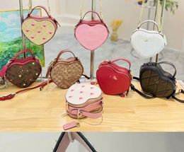 Cute girls heart handbag 2024 fashion baby crossbody shoulder bags mini kids strip purse