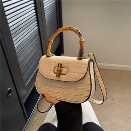 Small Design Bag for Women New High Quality Crocodile Pattern Bamboo Knot Handbag Sweet Saddle 7889