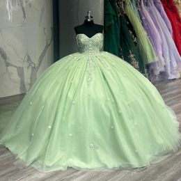 Abito da ballo glitter verde chiaro vestiti da quinceanera dalla spalla Applique in pizzo Tull corset Vestidos de 15 per 16 dolci ragazze 0417