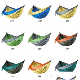 Hammocks 44 Colors Nylon Hammock With Rope Carabiner 106X55 Inch Outdoor Parachute Cloth Foldable Field Cam Swing Hanging Bed Bc Drop Dhxjy