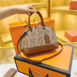 2023 New Fashion Printed Handbag Versatile Large Capacity Shell One Shoulder Women's Bag 70% off outlet online sale