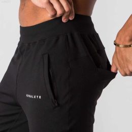 pantaloni della tuta firmati Jogger allenamento fitness pantaloni di cotone Alphalete nuovo stile uomo pantaloni della tuta uomo di marca palestre maschio moda casual pantaloni skinny pistaschq