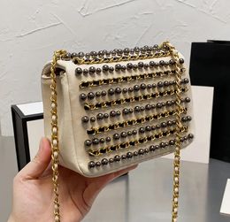 Designer Bags Pearl Chain Crossbody Bag Paris Brand Weave Chains Pearls womens Luxury Handbags Woman Leather Mini Flag pocket