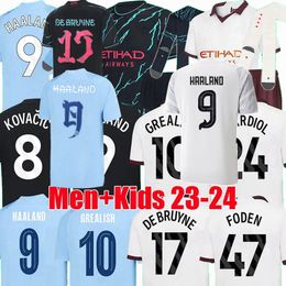 Player Fans HAALAND GVARDIOL Soccer Jerseys DE BRUYNE 2023 2024 MANS Man City WALKER STONES AKANJI J.ALVAREZ BERNARDO FODEN dragon 23 24 Football men kids shirts 4XL