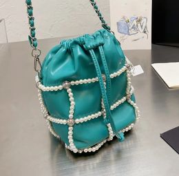 Pearl net shoulder bag for women Exquisite and small design of drawstring bags Elegant style women's soft leather pocket