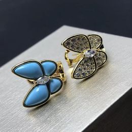 Silver charm cut earrings, diamond and turquoise butterfly shaped, with box turquoise Clover ear clip of high quality