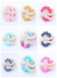 Wooden Teethers Toys Infant Silicone Chew Nursing Bracelets Baby Rattle Stroller Accessories Newborn Teeth Care Supplies 16 Colors8441308