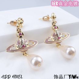 Viviennes Westwoods the pale pink paint water droplets pearl earrings elegant earrings