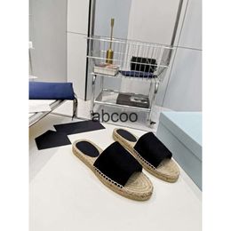 Designer channel slippers womens sandals flat bottomed canvas fishermans shoes open-toed grass woven hemp rope lazy mans shoes one foot canvas shoes