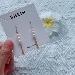 Earrings New tassel pearl earrings are casual fashionable elegant niche freshwater pearl s925 silver ear needles CCE4