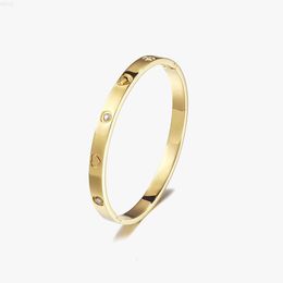 Non Tarnish 18K Gold Plated On Stainless Steel Material Stone Inlay Heart Engraved Bangle Jewellery