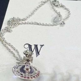 Projektant Viviane Vivienen Westwoods Biżuteria Nowa zachodnia cesarzowa Woodager Stopniowo fioletowy pełny diament planeta Ziemia