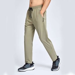 2024 Summer New Leisure Sports Pants Men's Nylon Sharp Cloth Straight Tube Running Fitness Training Guard Designer pant mens453