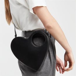 European And American Sex Heart-Shaped Clutch Fashion Bags Hollow Handle one-shoulder Messenger bag2866