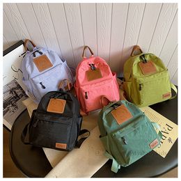 Kids smiling face backpacks Fashion children double shoulder bags Classical boys girls candy color nylon Casual backpack Z6858