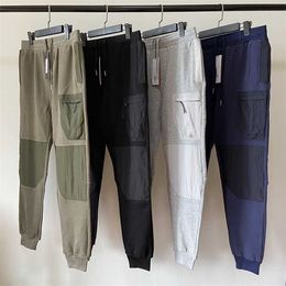 Mens Pants 4 Colours Designer Clothes The Best Quality CP Pants Mens Pants Womens Trousers Causal Pants Winter Outwear Hip Hop Trousers Ladys Pants With Badge Asian Siz