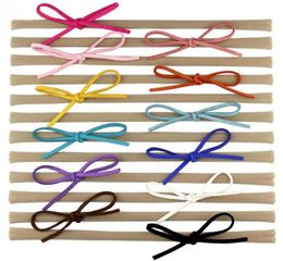 New Faux Leather Bow Baby Girl Elastic Nylon Headband Chic European Hair Accessories For Kids Headwrap Headwear 30pcs 203r3652257