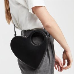 European And American Sex Heart-Shaped Clutch Fashion Bags Hollow Handle one-shoulder Messenger bag265H