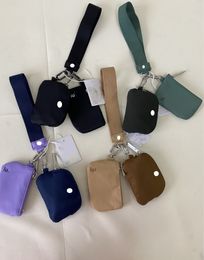 Luxurys dupla bolsa de pulso bolsa de embreagem lu mulheres chaveiro designer carteira à prova dmini água mini yoga saco destacável chaveiro