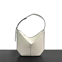 2024 New calf leather high-end and niche design for women's handbags, handheld single shoulder crossbody underarm bag, leather bag designer white