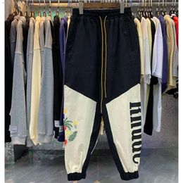 Мужские дизайнерские брюки Осенние бегуны Мужские хлопковые роскошные спортивные штаны для бега Повседневные брюки на пуговицах Мужские брюки RHUDE
