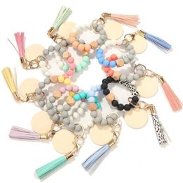 2024 Colorful Interlaced Letter Leather Tassel Bracelet Keychain Silicone Bead Bracelet Wooden Blank Keychain Disc