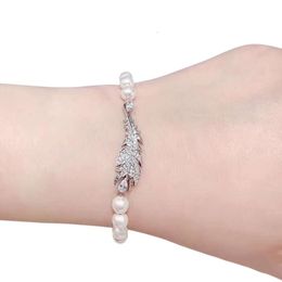 Bracciale Swarovski Designer Lusso Moda Donna Qualità originale Nuovi arrivi Personalizzato Piuma leggera Fibbia magnetica Romantica Perla piena di diamanti