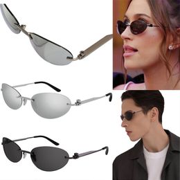 Ladies Luxury Oval Frame Metal Sunglasses Fashion Colour Changing Lenses UV400 Resistant Glasses High Quality Frameless Glasses Multi Colour Available BB0179