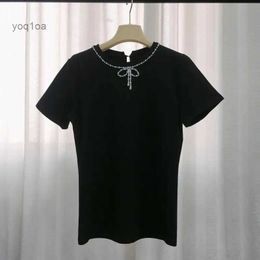 Women's T-Shirt Women's Wool Blends High Quality Brand Luxury Top 2023 Summer New Pearl Bowknot Bead Necklace O-neck Black White Short Sleeve T-shirt Casual Clothes
