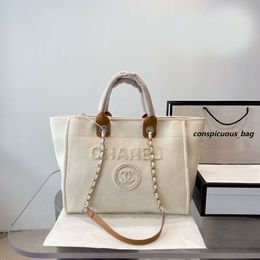Designer Bag Summer Beach Handbag C Letter Shoulder Flash Office High Quality Classic Women's Canvas With Button Retro Luxury