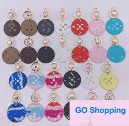 All-match Wholesale Car Keychain Ornaments round Brand Contrast Colour Presbyopic Keychain Pendant