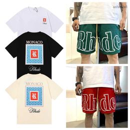 Designer t Shirts Mens Shorts Women Man Cloing Graphic Tees Pattern Tops Summer Short Sleeve Tshirt Hip Hop Letters Graffiti Print Loose Rhude Causal Pants 7smrI9EB