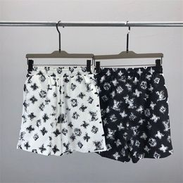 Summer new fashion beach pants five-point shorts women's polar beach pants high street sports shorts men's letter-printed casual shorts overalls k33S3