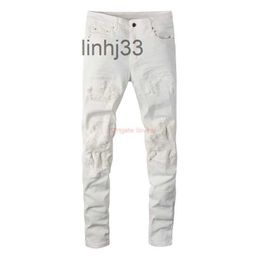 Mens Jeans Mens Designer Clothing Amires Denim Pants Amies High Street White Damaged Hole Patch Ins Youth Elastic Slim Fit Distressed Ripped Skinny Motoc