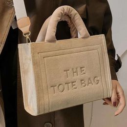 2024 New Versatile Popular Simple Plush Women's Personalised Crossbody Commuter Handheld Tote Bag 2024 Design Fashion 78% Off Store wholesale
