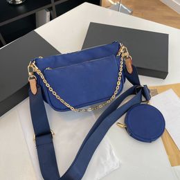 Fashion top quality brand-name bag chain designer crossbody bags classic solid Colour triangle logo shoulder bags couple with black.
