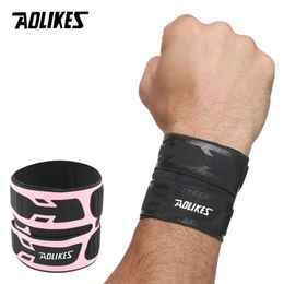 Wrist Support AOLIKES 1PCS Wrist BraceUltra-thin Compression Wrist Straps Wrist Support for Workout Weightlifting Tendonitis Sprains YQ240131