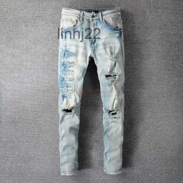 Men's Jeans Designer Clothing Amires Denim Amies 697 High Street Broken Letter Sticker Cloth Used Wash Water Elastic Fit Ins BlueKXI1