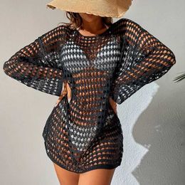 Women's Swimwear Looking through the hollow bikini cover top womens beach wear long sleeved beach dress crop top crochet swimsuit cover 2023 J240131