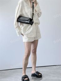 Pre-Owned Luxury Underarm Bag: Chic High-End Niche Single Shoulder Genuine Leather Pillow Bag, French Baguette Cylinder Crossbody with Sleek Finish Women Minimalism