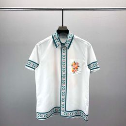 Camicia casual da uomo Camicia firmata 24ss Camicia button down da uomo Camicia casual stampata con fiori hawaiani Camicia casual hawaiana slim a maniche corte da uomo Taglia M-3XL #002