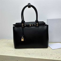 HOT Top Quality Leather Designer Bag Triumphal Arch Womens Bag With Lock Luxurys Handbags Large Capacity Briefcase Portable Tote Bag 230815