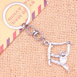 Keychains 20pcs Fashion Keychain 39 32 Mm Hanging Monkey Pendants DIY Men Jewellery Car Key Chain Ring Holder Souvenir For Gift