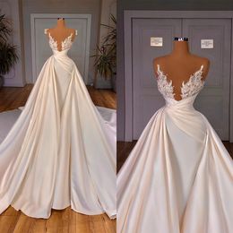 Abito da sposa di lusso senza spalline Abiti da sposa a sirena con applicazioni di paillettes con gonne oversize Abiti da sposa con perline di perle Realizzati su misura