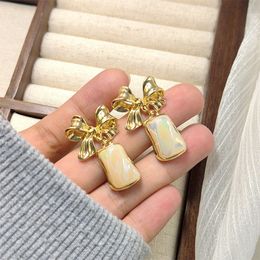 Design Sense, Personalized Baroque Pearl Bow Earrings, Fashionable Metal Style Earrings